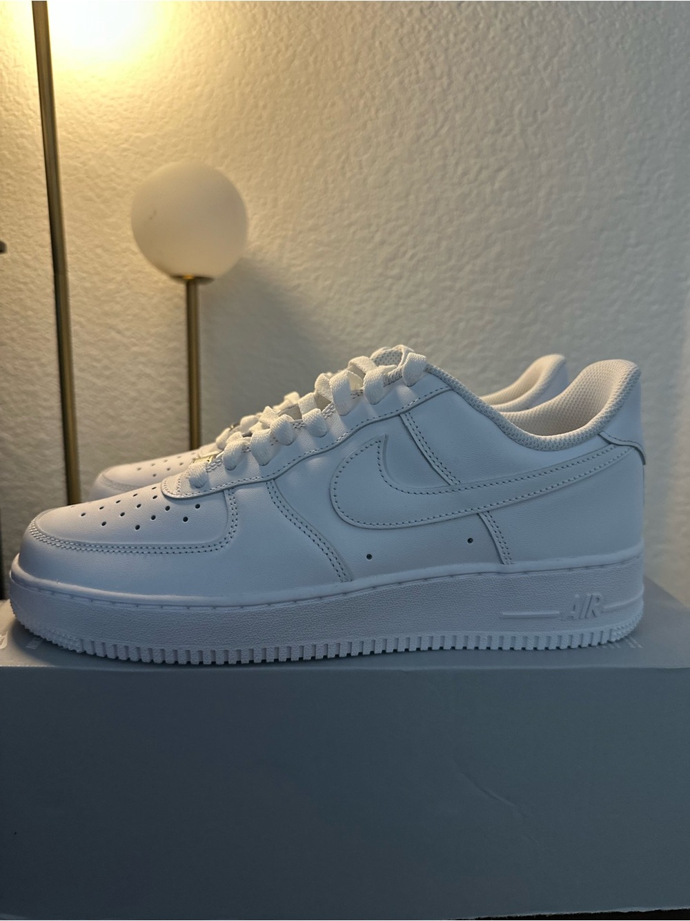 Nike Air Force 1 '07 white sneakers
Size US 9.5